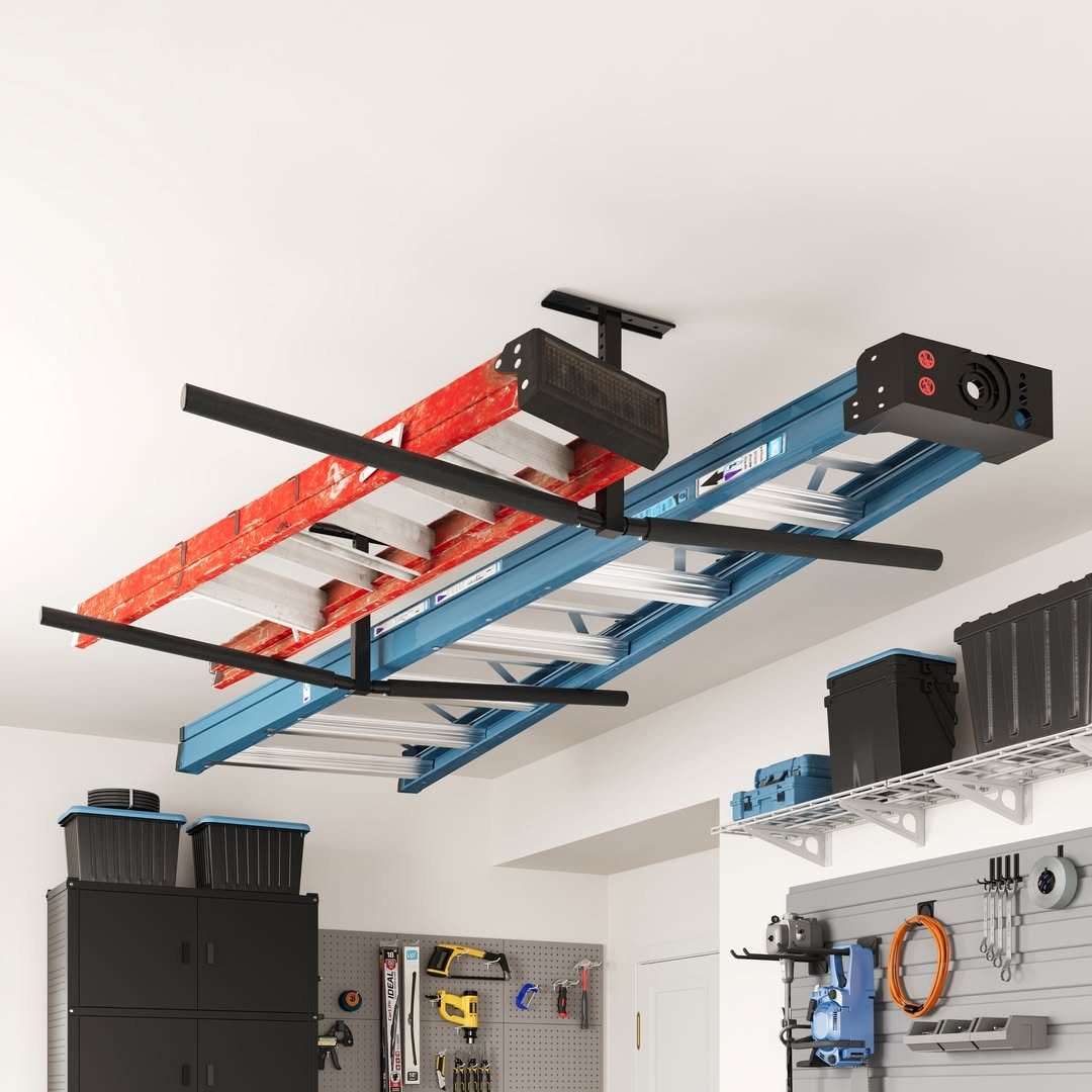 11 Garage Storage Inspiration and Ceiling Systems That Actually Fit 2 Red and blue ladders mounted flat against a white garage ceiling using black metal brackets.