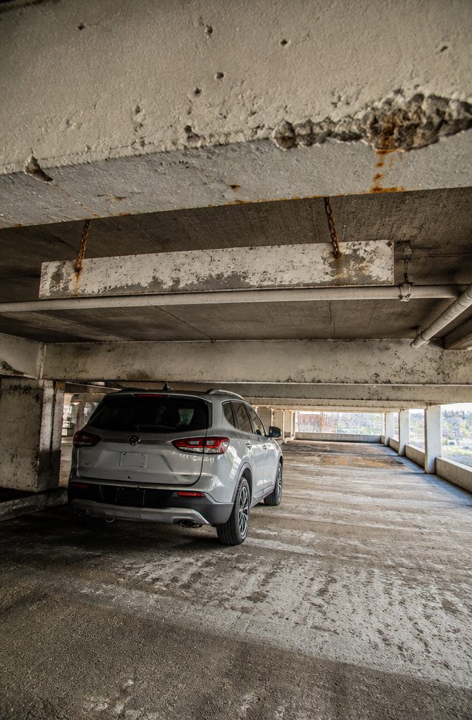 Parking Garage Fits: Clearance Heights by Structure Type for Tall Vehicles 4 A parking deck showing low clearance, suitable for most sedans.