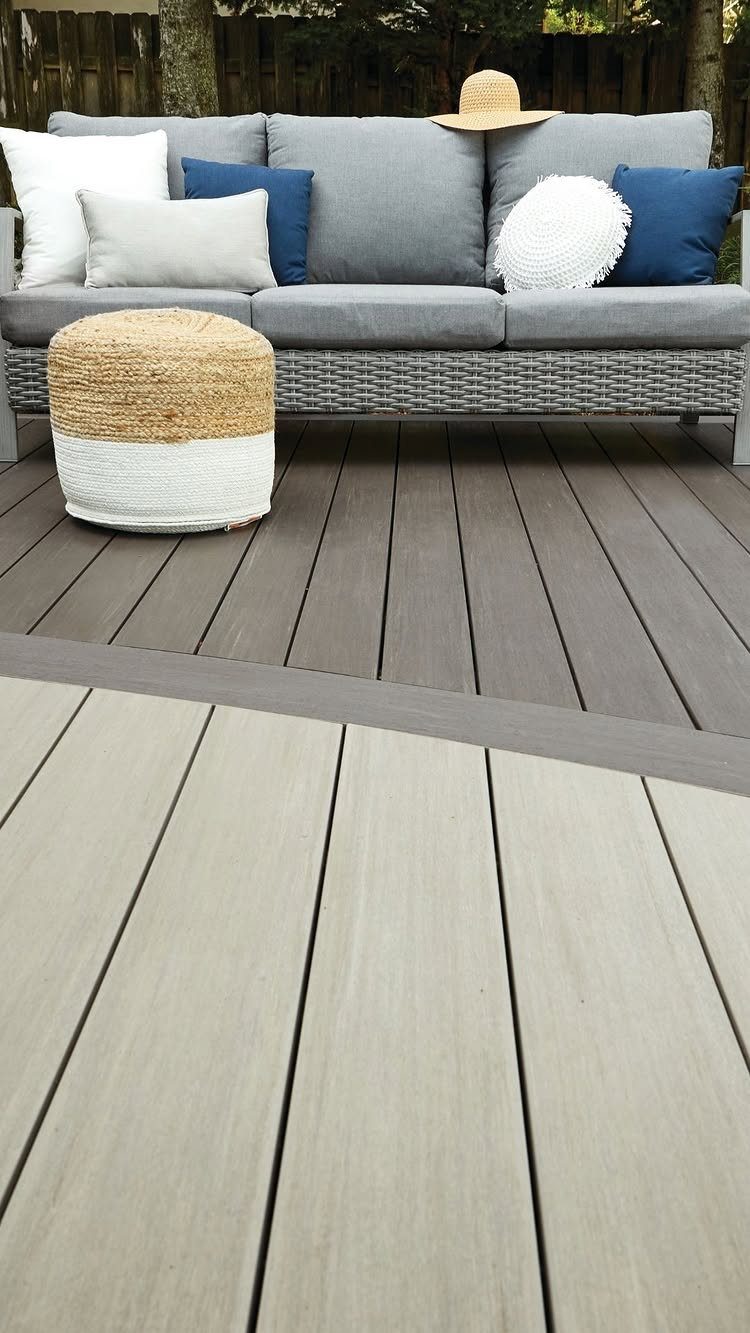 12 Trex Deck Floor Designs for Picture Frames to Herringbone 1 Two-toned composite deck boards in dark grey and light beige with a grey border strip.